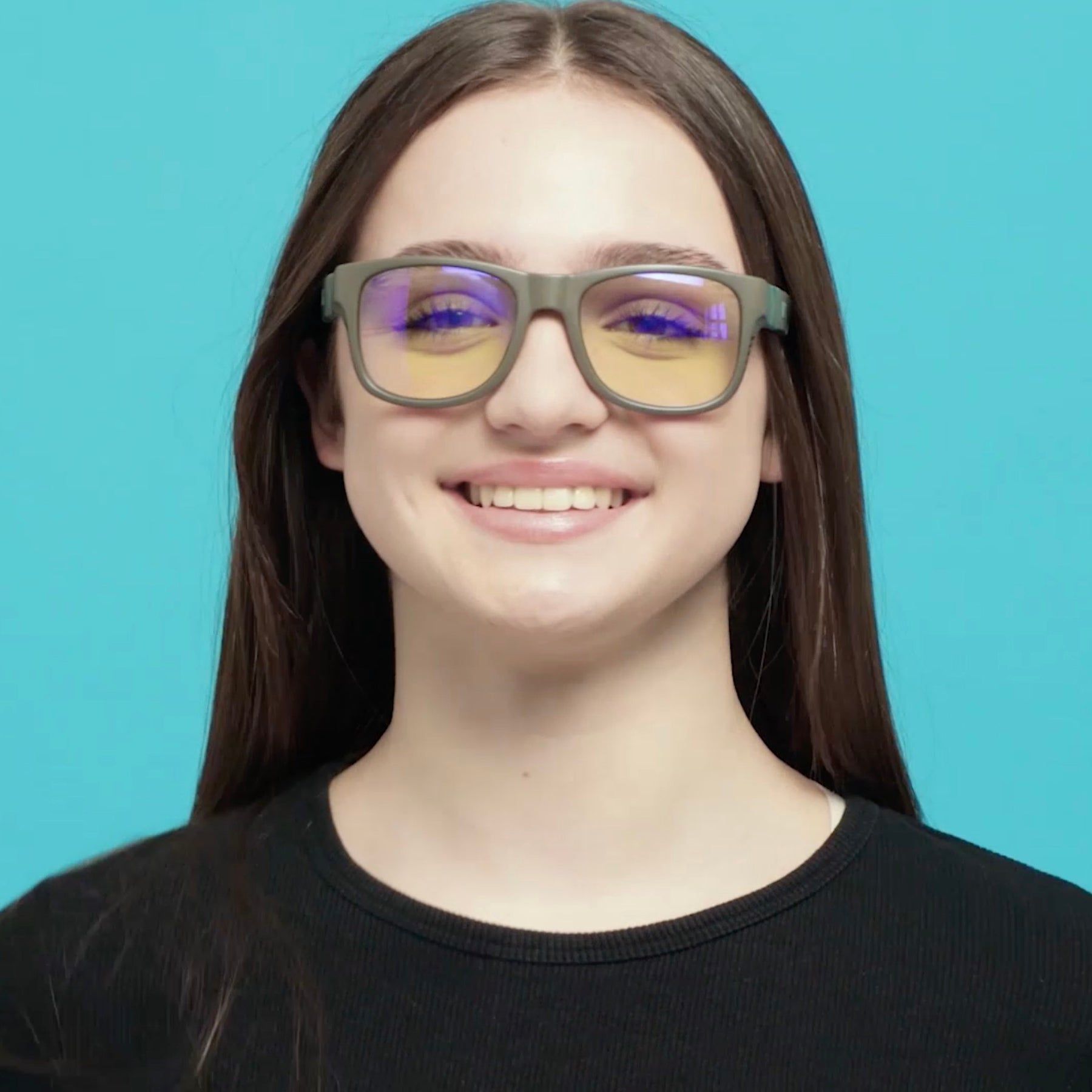 Girl wearing Mokki Click & Change MultiUse Photochromic sunglasses